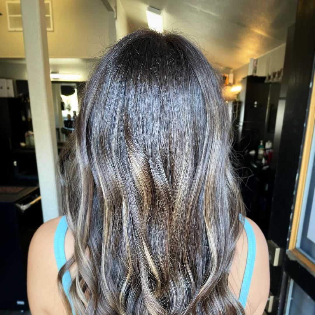light highlights to the back of brunette hair add interest and freshness